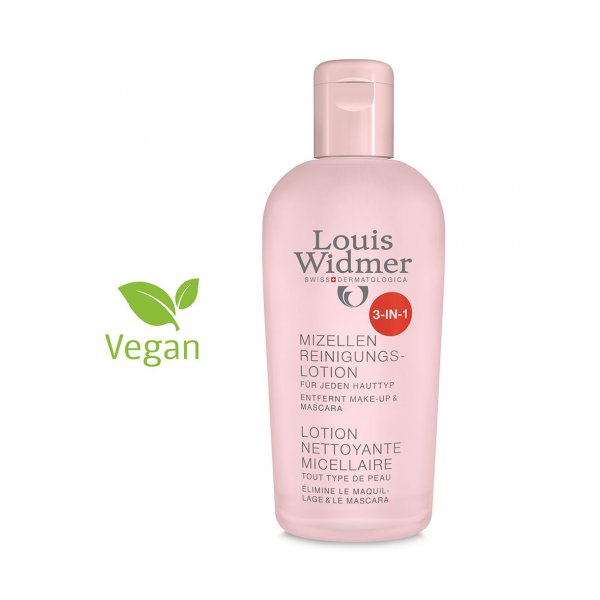Flasche mit Louis Widmer Mizellen Reinigungs-Lotion in Rosa, gekennzeichnet als vegan und 3-in-1 für jeden Hauttyp.
