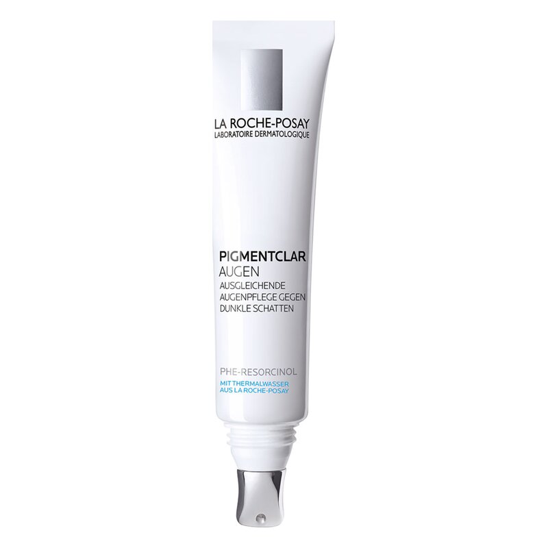 Hautpflegecreme in weißer Tube mit silberner Applikatorspitze, beschriftet für dunkle Augenringe.