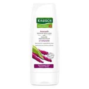 Tube mit Amaranth Reparatur-Spülung, weiße Verpackung mit grüner und lila Beschriftung, Pflanzenillustrationen enthalten.