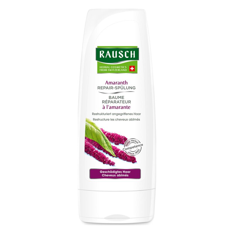 Tube mit Amaranth Reparatur-Spülung, weiße Verpackung mit grüner und lila Beschriftung, Pflanzenillustrationen enthalten.