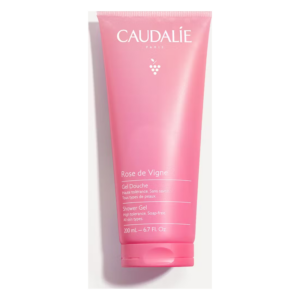 Rosa Kunststofftube mit Duschgel von Caudalie, beschriftet mit "Rose de Vigne" und Hinweisen zur Hautverträglichkeit.