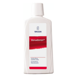 Weleda Venadoron Flasche mit der Aufschrift "Leichte Beine, natürlich schön" und einem roten Streifen.