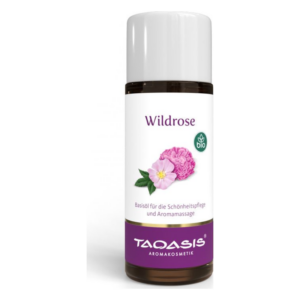 Braunes Fläschchen mit weißem Deckel, beschriftet mit "Wildrose" und Bildern von Rosenblüten, Bio-Produkt.