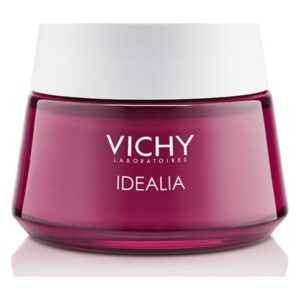 Vichy Idealia Gesichtscreme in einem runden, lila Glasbehälter mit weißem Deckel.