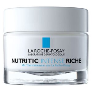 Weißer Pflegecreme-Behälter mit blauer und schwarzer Schrift, Beschreibung ‚NUTRITIC INTENSE RICHE‘.