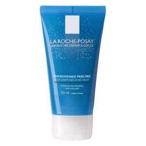 Eine blaue Tube mit mikroschichtigem Peeling für empfindliche Haut, mit einem weißen Deckel und dermatologischen Hinweisen.