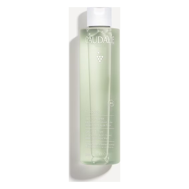 Flasche mit grünlich-transparentem Gesichtstoner von Caudalie, etikettiert als Vinopure, bio-zertifiziert.