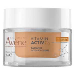 Eine durchsichtige Cremeverpackung mit einem weißen Deckel, die eine intensiv pflegende Creme mit Vitamin C präsentiert.
