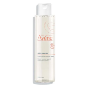 Flasche mit Avène Mizellenwasser für empfindliche Haut, transparent mit Pumpspender und rosa Schriftzug.