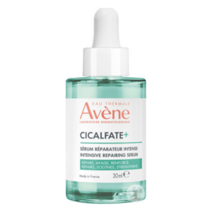 Transparente Flasche mit Pipette, gefüllt mit einem intensiven Reparaturserum von Avène, 30 ml.
