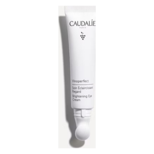 Eine weißtube mit einem rollenden Applikator für eine Aufhellende Augencreme von Caudalie.