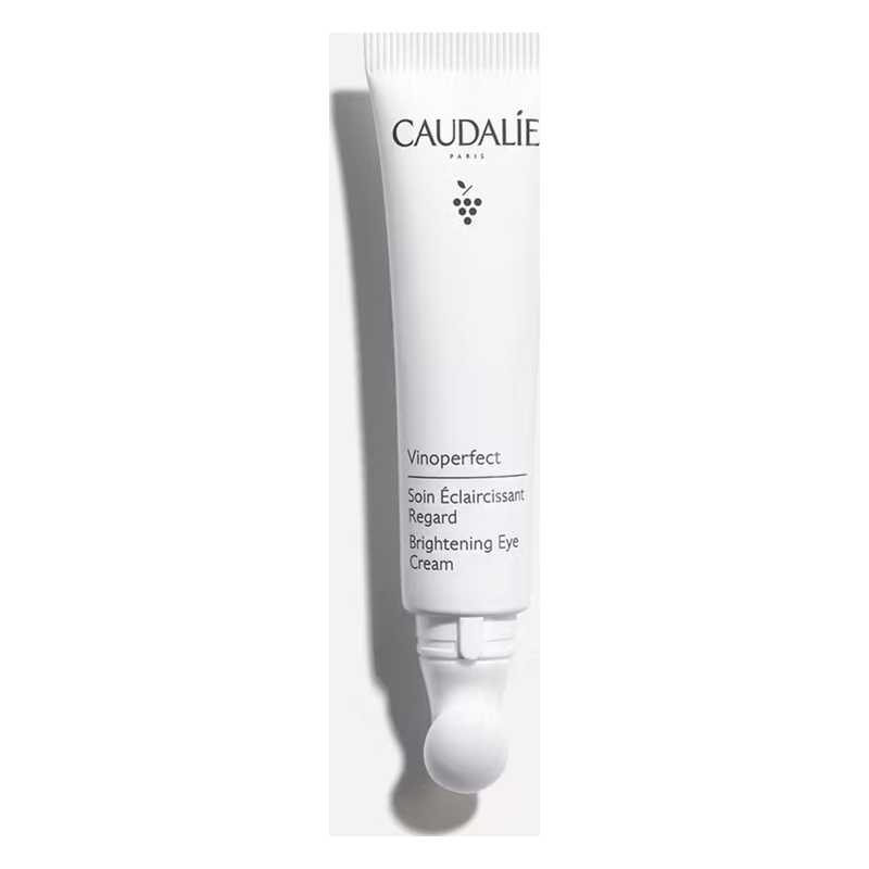 Eine weißtube mit einem rollenden Applikator für eine Aufhellende Augencreme von Caudalie.