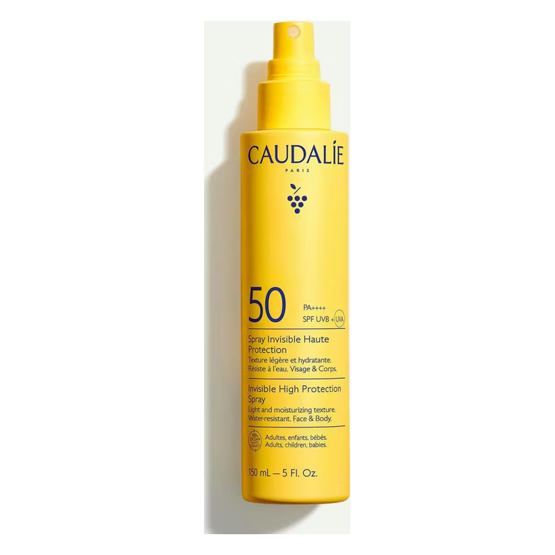 Sonnenspray mit Lichtschutzfaktor 50 in einer gelben Flasche, wasserfest, für Gesicht und Körper.