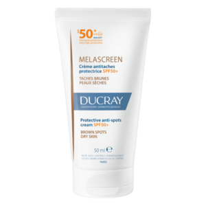 Weiße Tube mit Schutzcreme gegen braune Flecken, SPF 50+, für trockene Haut, Marke Ducray.