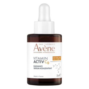 Braunes Fläschchen mit Pipette, Avène Vitamin Activ Cg Radiance Serum, 30 ml, mit weißen und orangefarbenen Details.